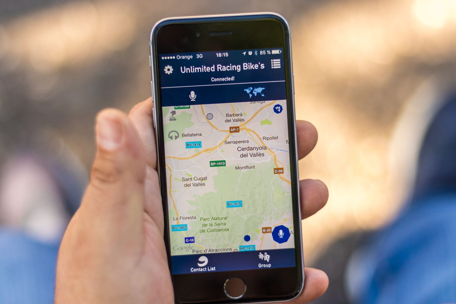 A hand holding a phone showing a cycling app with a map and location markers on it. Records like these, held by a company, are what the Court ruled police cannot demand without satisfying the Fourth Amendment.